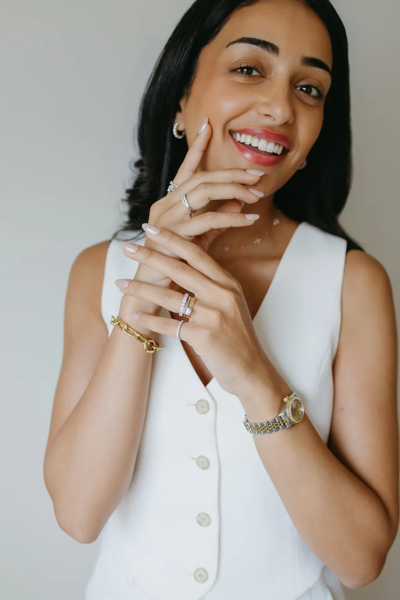 Manicured hand with custom neutral pink finish, the Executive Manicure at Take My Hand Toronto