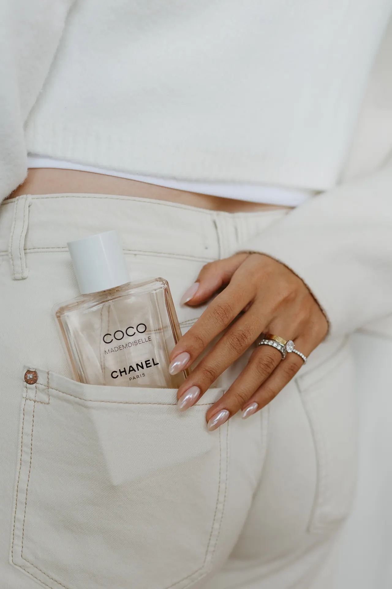Manicured hand with refined neutral regular polish, the Manicure + Regular Polish service at Take My Hand Toronto